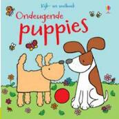 Kijk en voelboek Ondeugende Puppies - Fiona Watt (ISBN 9781409525523)